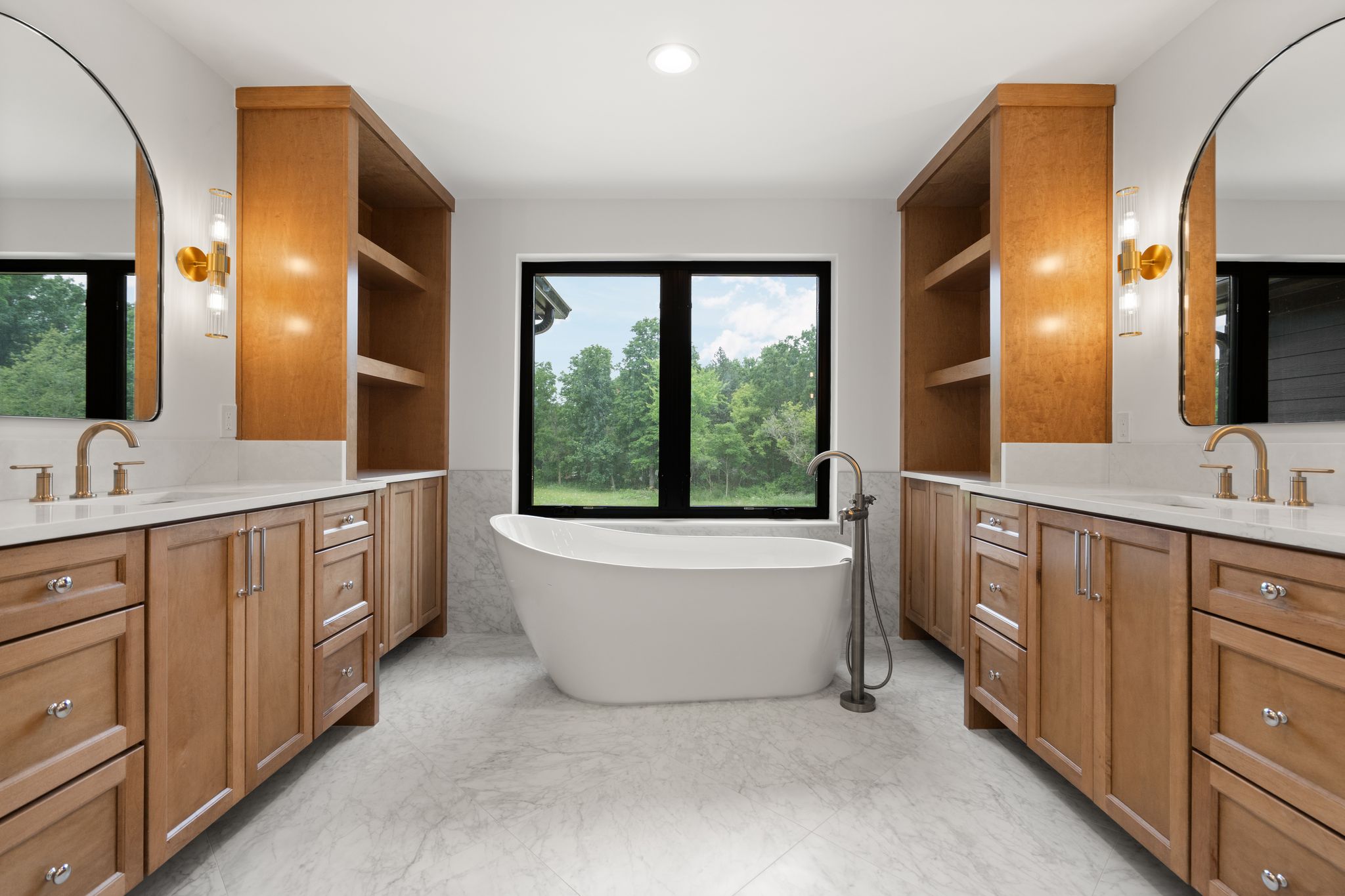 Primary bathroom with marble finishes