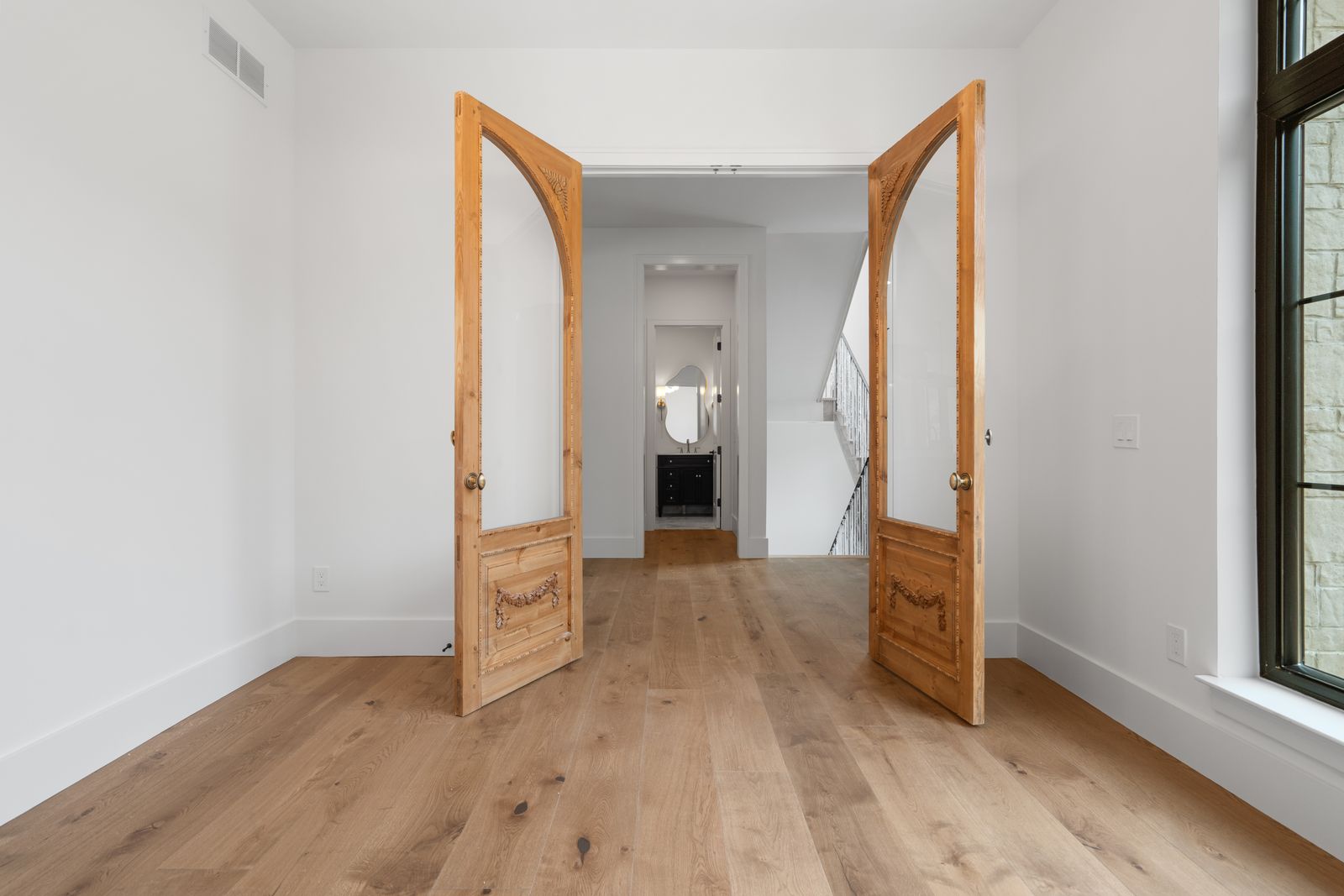 Back hallway with double doors