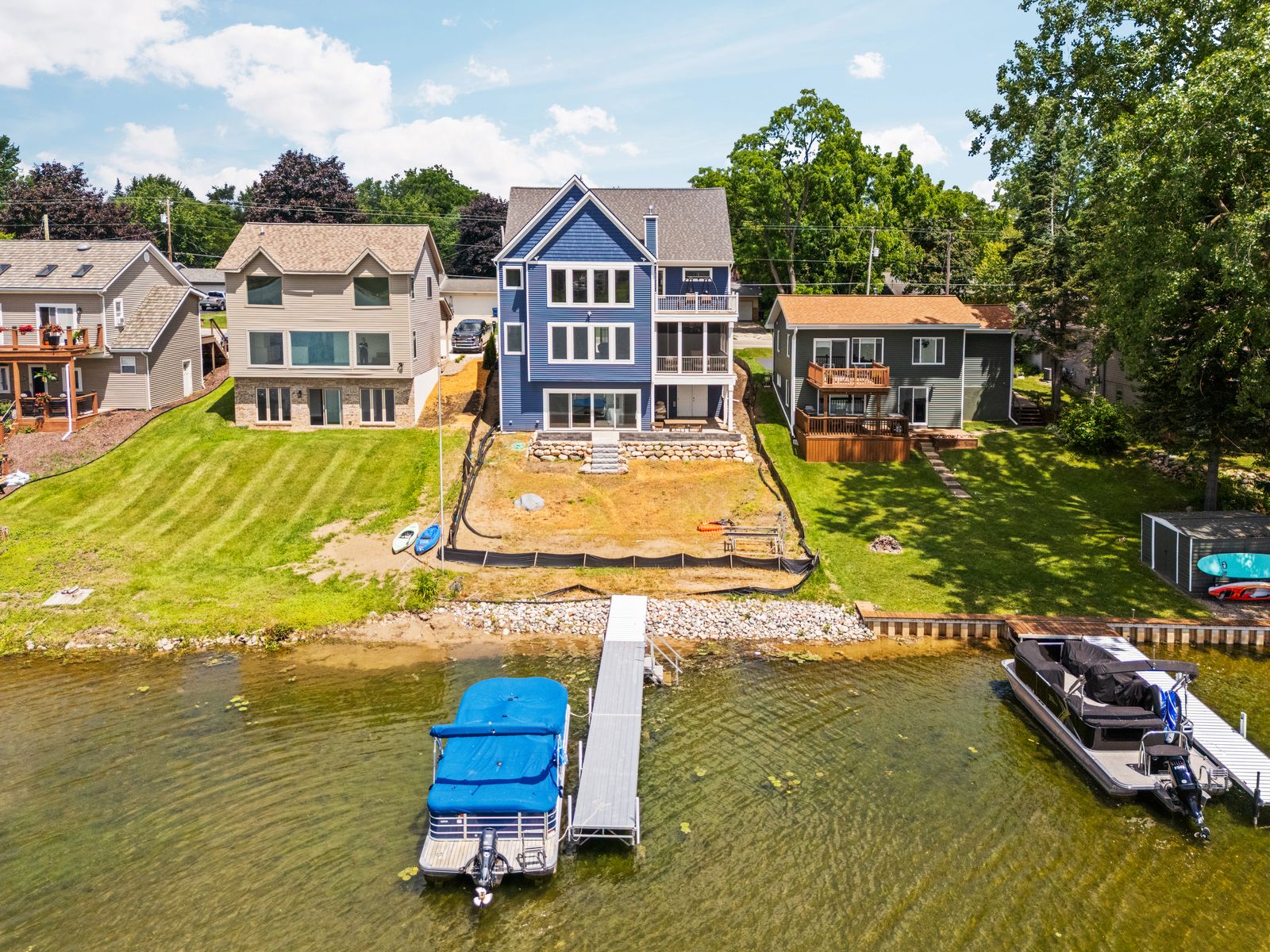 Rear exterior with dock and boat lift