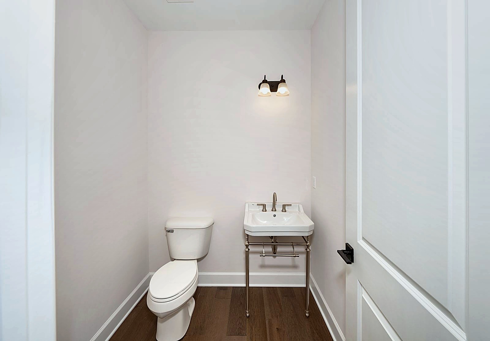 Powder bathroom with pedestal sink