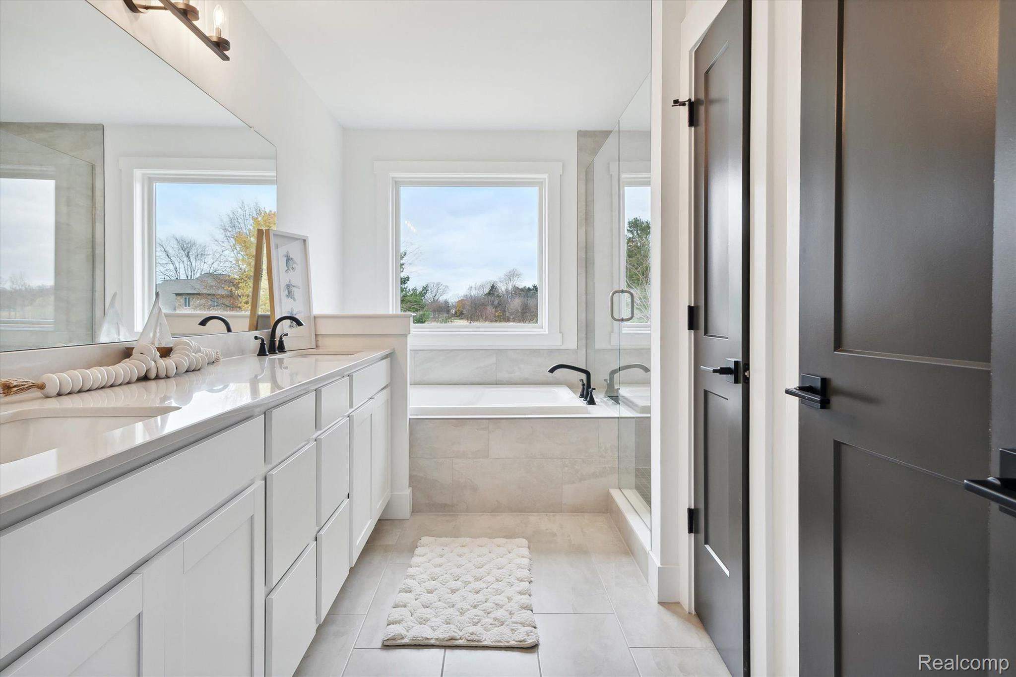 Primary bathroom, double vanity and soaking tub