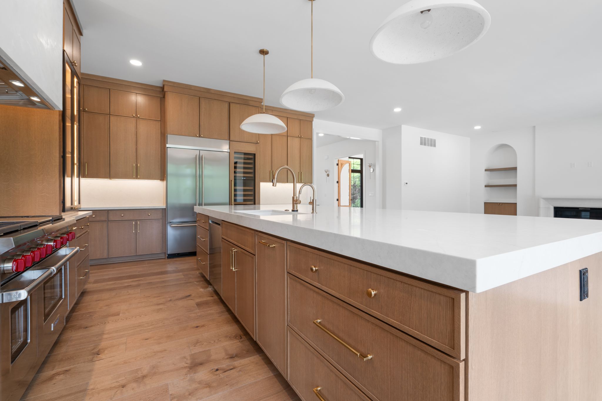 Kitchen with oak and cream cabinetry